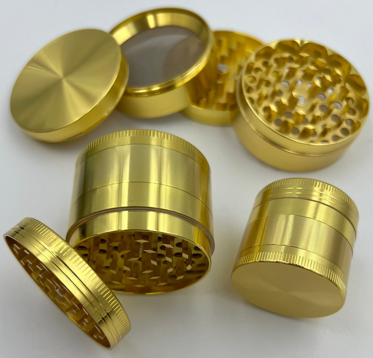 4-Piece Zinc Alloy Grinders - 40mm, 55mm & 63mm - Assorted Colors (Sm GR-12, Med GR-13 & Lg GR-14)